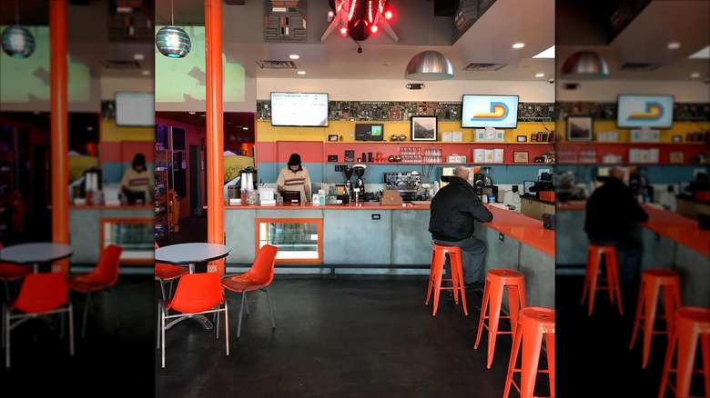 Coffee bar and seating inside the Avondale location of Domestique