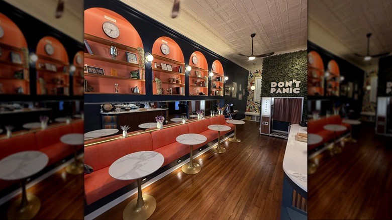 Interior seating area of Paper Plain Coffee Co.