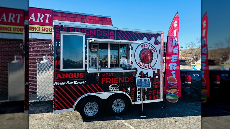 Red Lion Burger food truck open for business in a parking lot