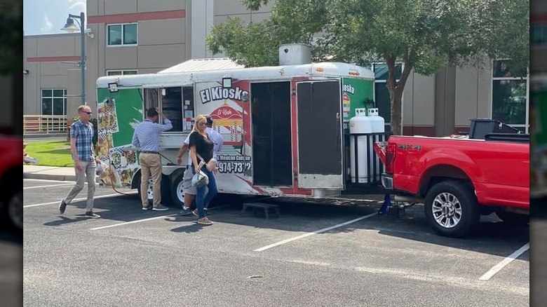 El Kiosko Mexican Cuisine food truck with customers outside