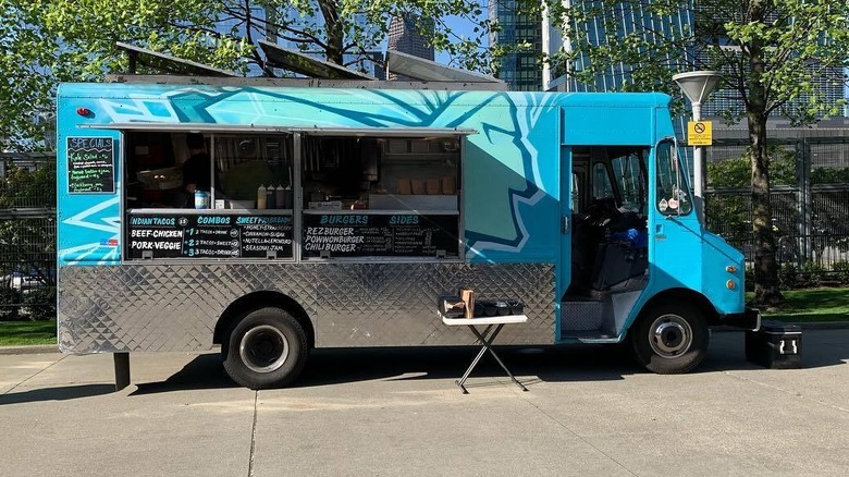 The blue Off the Rez food truck parked on a city street