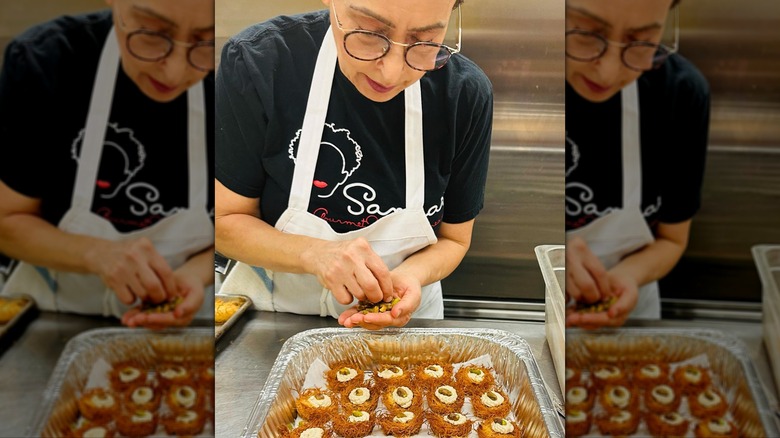 Chef Sanaa Abourezk preparing pastries from scratch at Sanaa's Gourmet Mediterranean