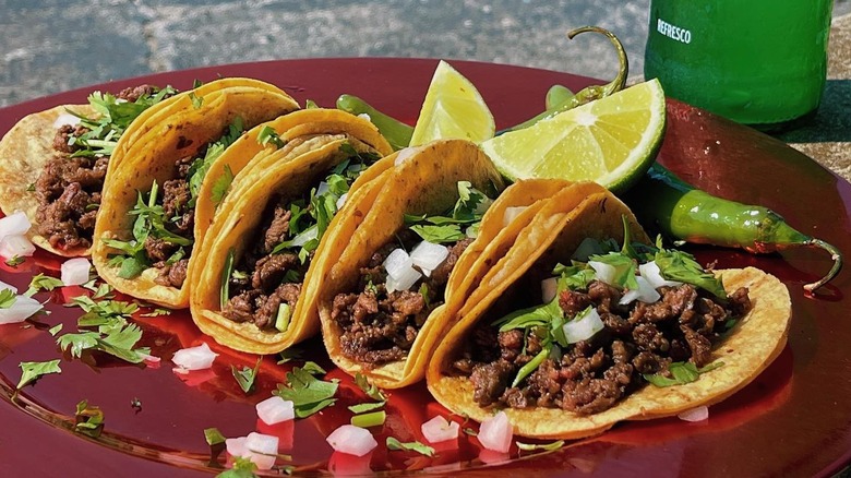 A plate of al pastor tacos from Dos Hermanos