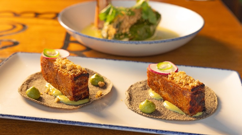 A plate of tacos de cochinillo at Casi Cielo