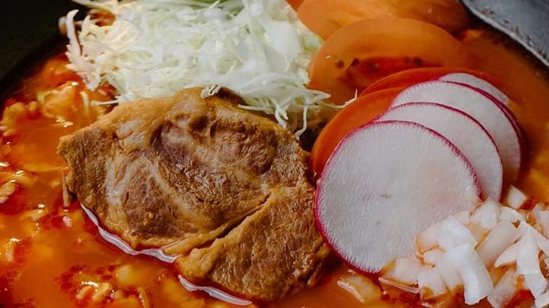 A bowl of pozole at Amano