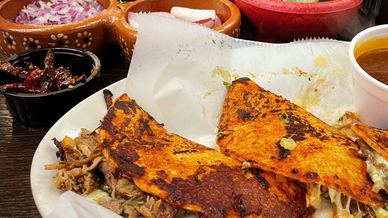 A plate of birria tacos at Birrieria Diaz