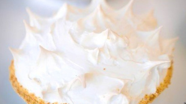 Close up of a whole lemon meringue pie