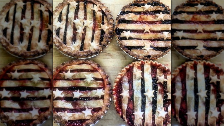 Four whole lattice pies decorated with stars