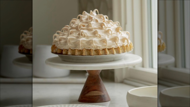 Whole  Chocolate Meringue Pie on decorative cake stand