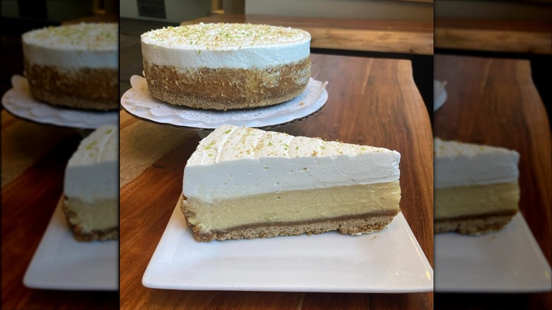 Whole and slice of Key Lime Pie on white plates