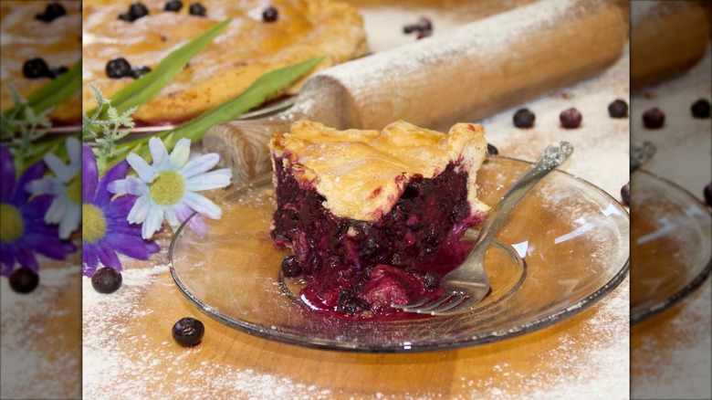 Slice of Bumbleberry Pie on a glass plate