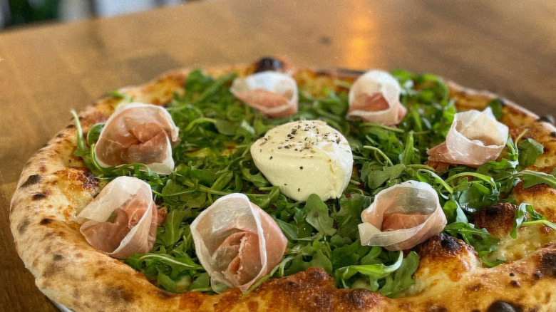 The Prosciutt' of Happiness pizza at Stone Mill Pizza in Delaware