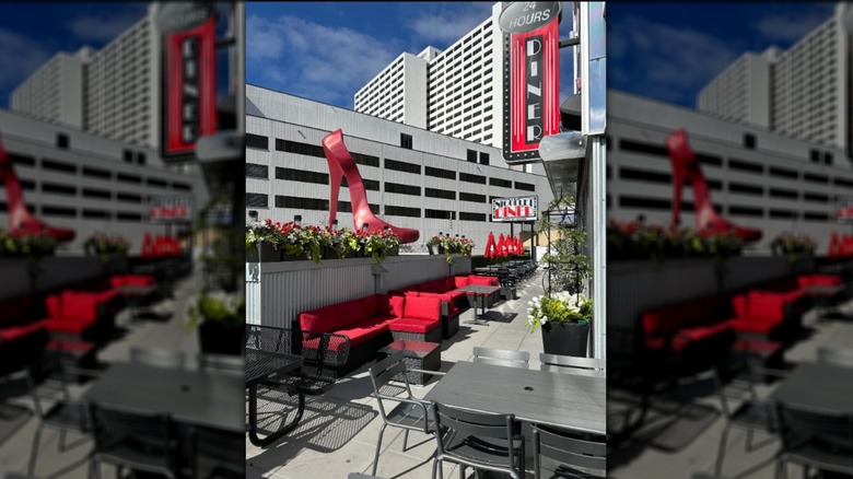 Photo of the outdoor patio at On the Rox with the iconic red high heel from Roxy's and the sign for Nicollet Diner in the background