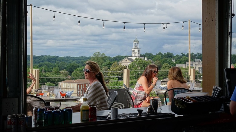 View of the patio at 10 South and the historic buildings in the distance