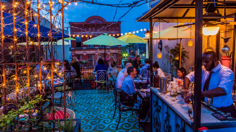 View of Skinner's Loft rooftop patio at dusk