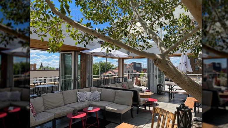 Outdoor patio at LÜFT Rooftop Bar