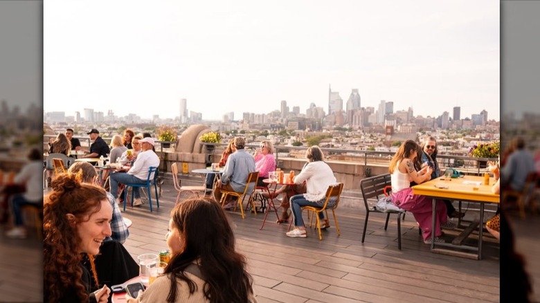 Patio at Bok Bar with city skyline in the background
