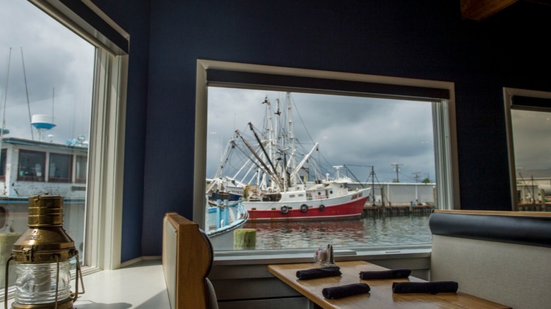 Booth inside The Shrimp Box looking out onto the water
