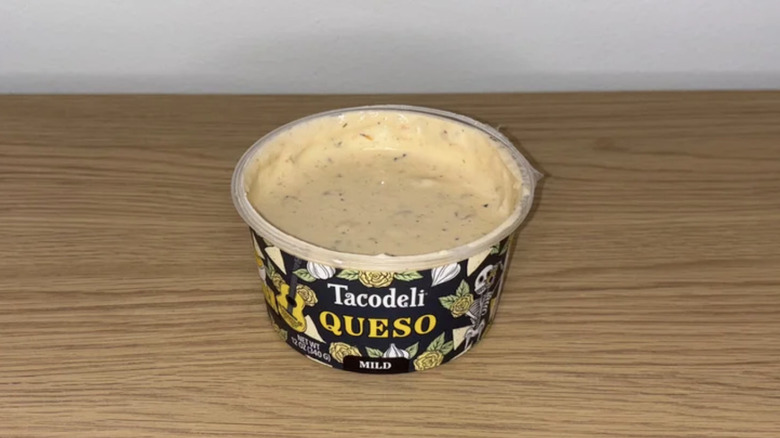 a tub of Tacodeli queso