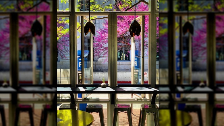 Seating area in front of window at Takashi