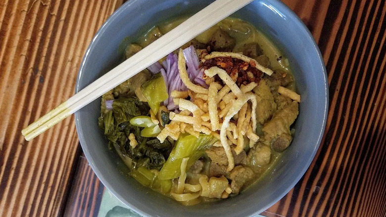 A bowl of khao soi noodle soup at Ghin Khao