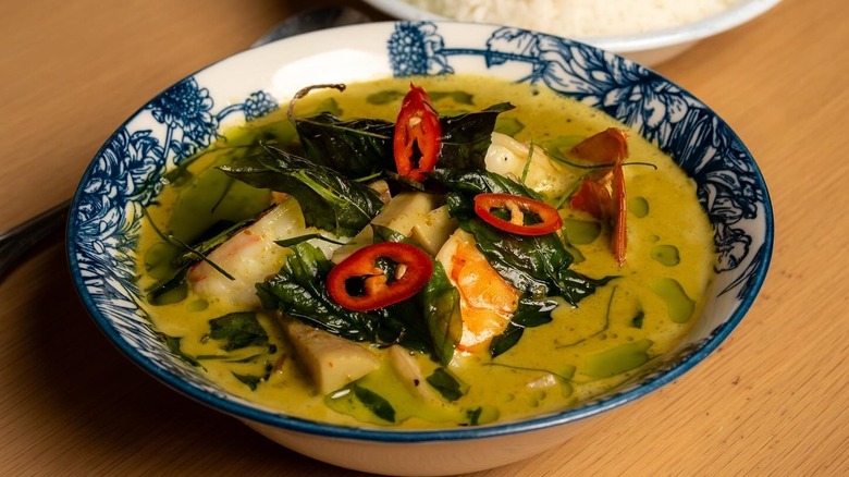 A bowl of Thai green curry with shrimp at Kalaya