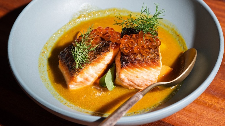 A bowl of salmon curry at Langbaan