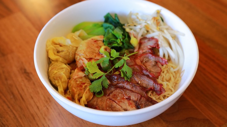 A bowl of wontons, noodles, and barbecue pork at Luv2Eat Thai Bistro