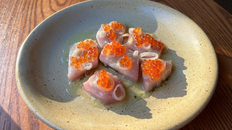 A plate of hamachi crudo at Talat Market