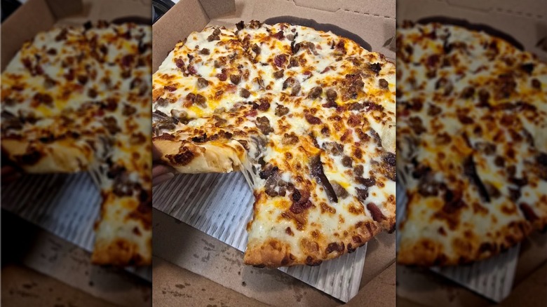 Domino's pan pizza with Philly cheesesteak, bacon, extra cheese, and garlic parm sauce