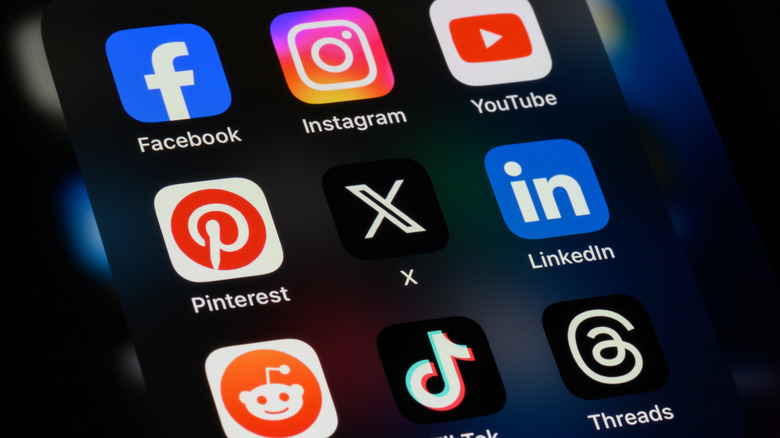 Social media app icons on a smartphone