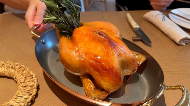 Louise Hong Kong-style chicken on a plate stuffed with herbs