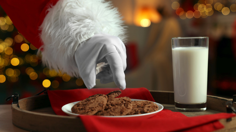 Santa's hand grabbing for cookies