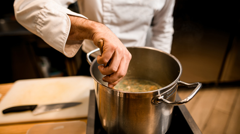 Chef making soup