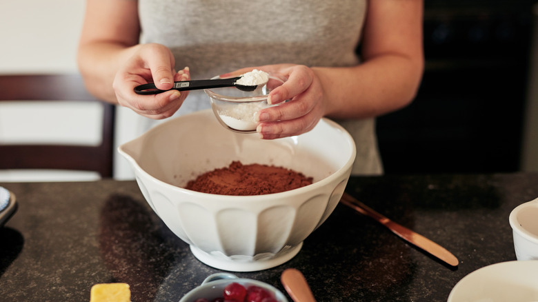 Adding baking powder to mix