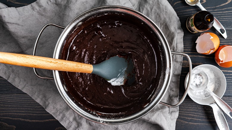A mixing bowl filled with brownie batter