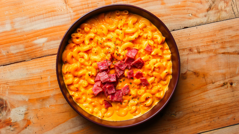 A bowl of macaroni with sausage