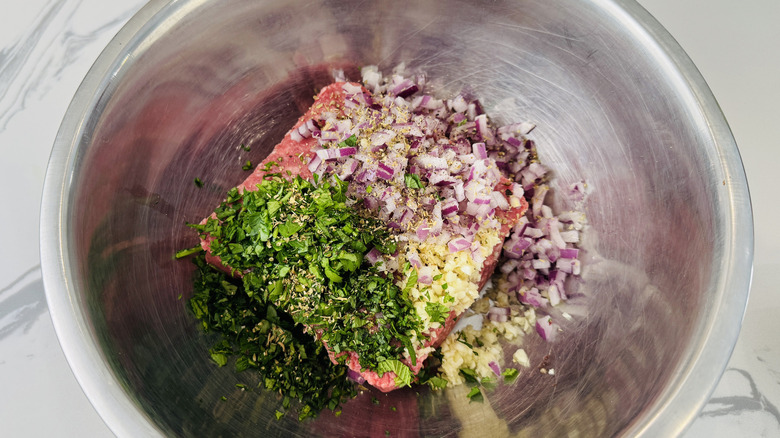 Lamb burger ingredients in bowl