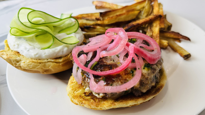 Lamb burgers assembled on plate