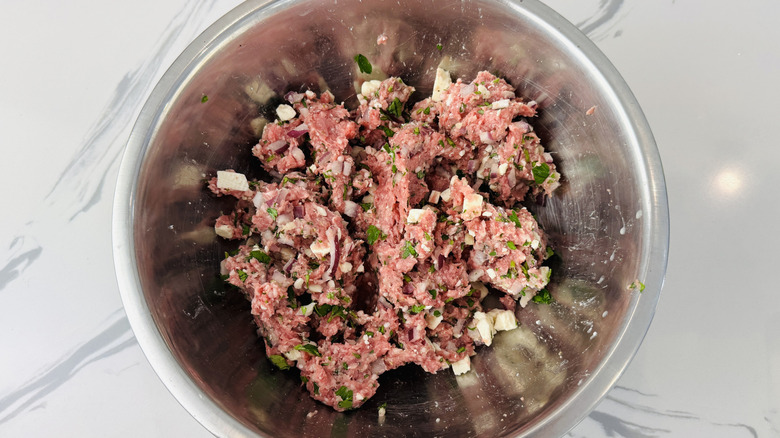 Feta in lamb burger mixture