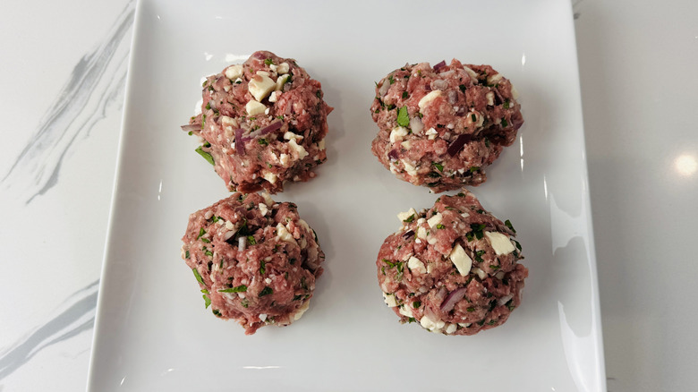 Lamb burgers in portions