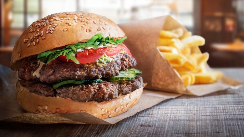 Fast food double hamburger with fries