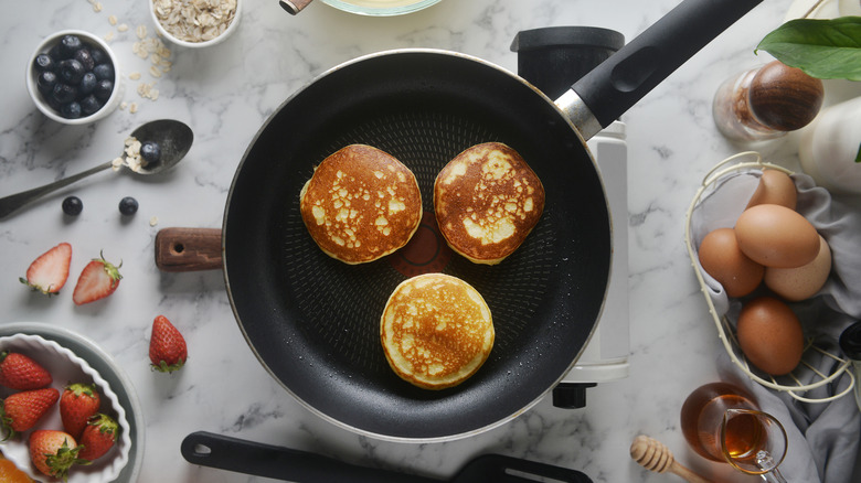 Three pancakes in pan