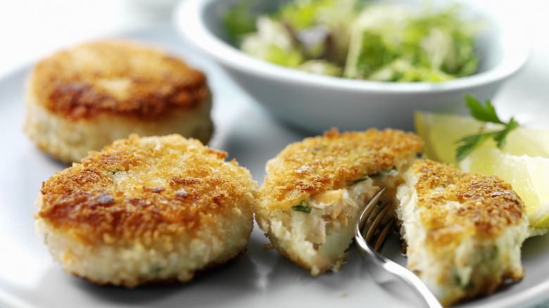 Plated and sliced open crab cakes