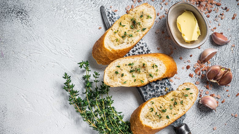 garlic bread slices with butter and herbs