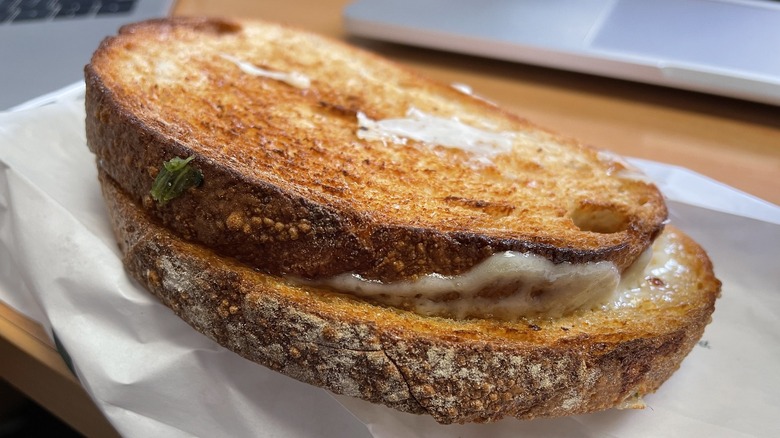 Close up of Starbucks Sourdough Grilled Cheese Sandwich on a Starbucks bag