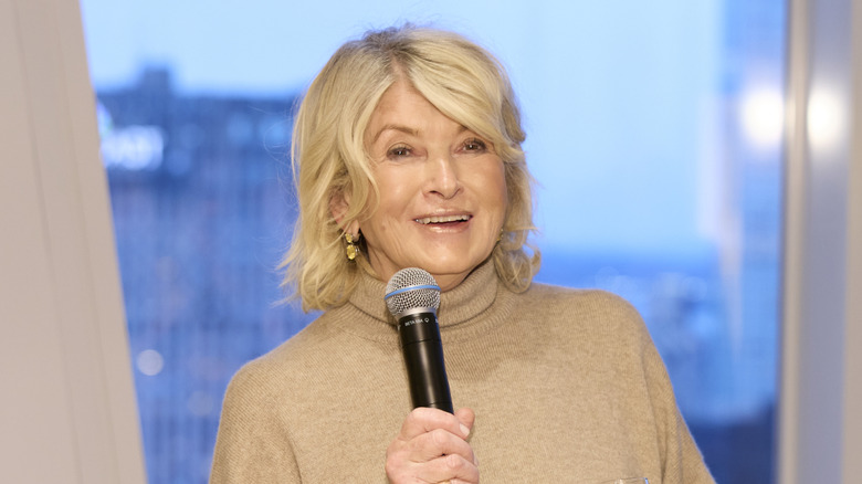 Celebrity chef Martha Stewart speaks at a podium at an event.