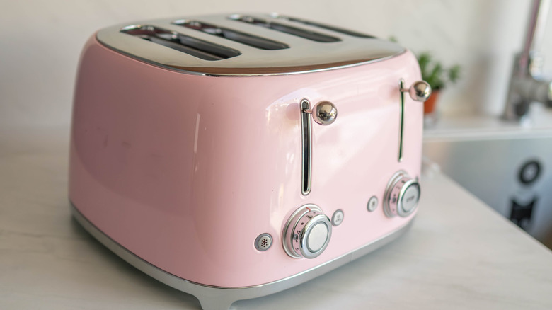 Pink retro toaster close up