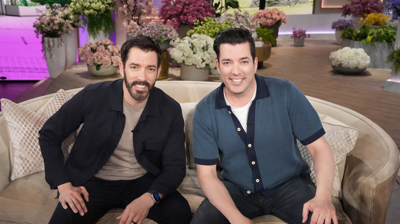 Property Brothers Drew and Jonathan Scott sitting