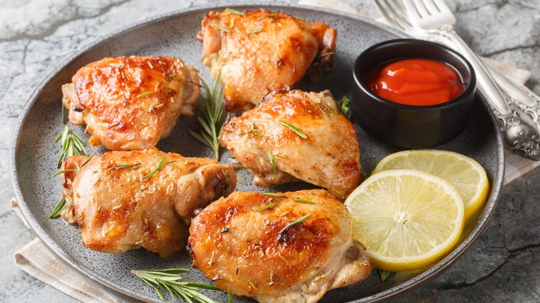 Marinated baked chicken thighs with herbs